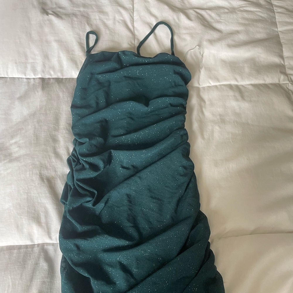 Knee length sparkly body con dress